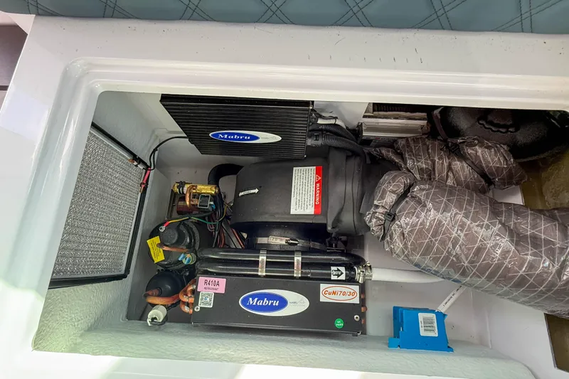 Maverick Yacht Photos Pics Engine compartment of 2023 Axopar 37 XC AFT CABIN with Mabru components.