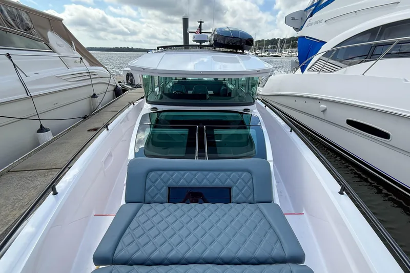 Maverick Yacht Photos Pics 2023 Axopar 37 XC AFT CABIN luxury boat docked at marina.