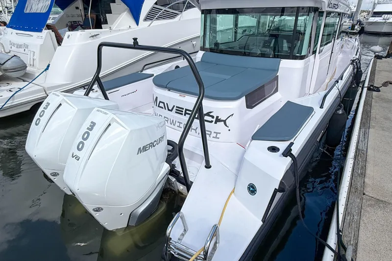Maverick Yacht Photos Pics 2023 Axopar 37 XC AFT CABIN with twin Mercury 300 V8 engines docked at marina.