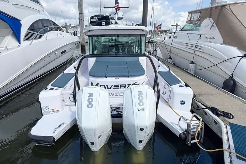 Maverick Yacht Photos Pics 2023 Axopar 37 XC AFT CABIN boat docked with twin Mercury 300 V8 engines.
