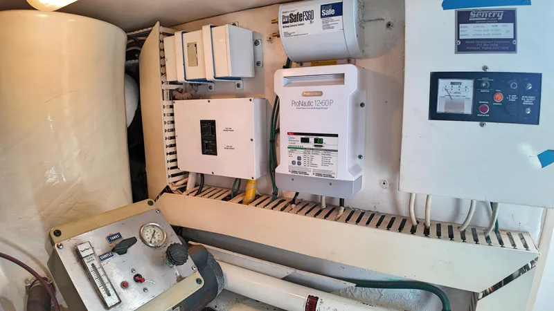  Yacht Photos Pics Electrical panel and controls inside a 1998 Viking 47 Convertible boat.