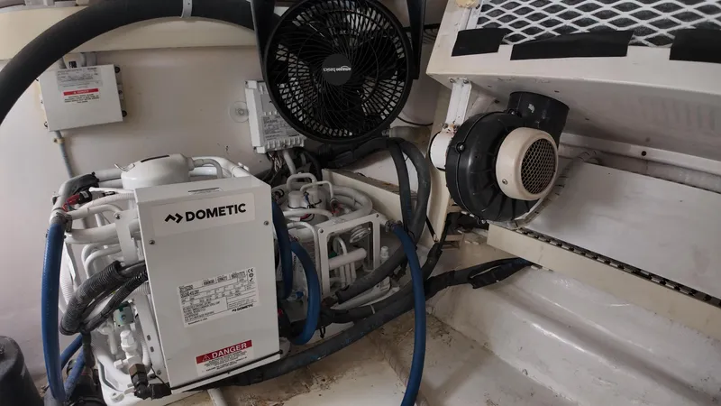  Yacht Photos Pics Engine room of 1998 Viking 47 Convertible with Dometic equipment and ventilation system.