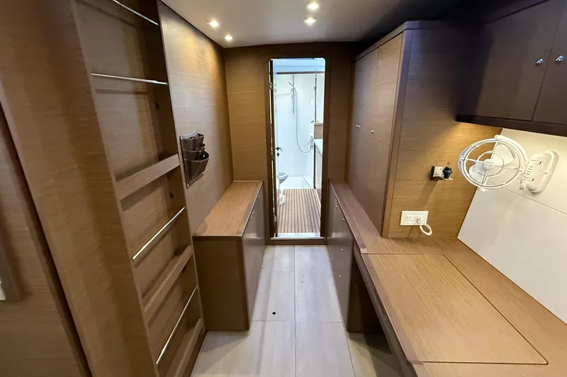  Yacht Photos Pics Interior of 2019 Lagoon 450 yacht, featuring wood paneling and modern amenities.