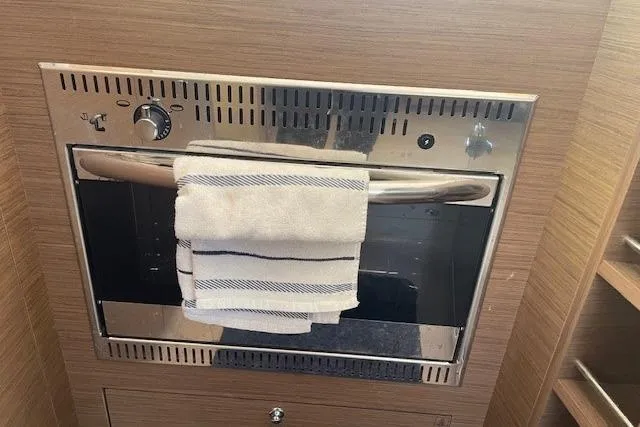  Yacht Photos Pics Built-in oven in Lagoon 450 yacht kitchen, 2019 model, with a towel on the handle.