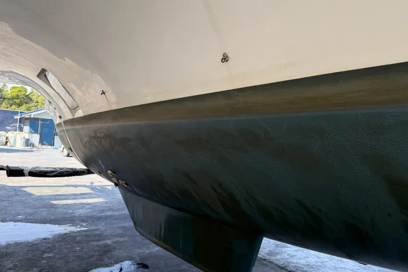  Yacht Photos Pics 2019 Lagoon 450 catamaran hull in dry dock, showcasing sleek design and structure.