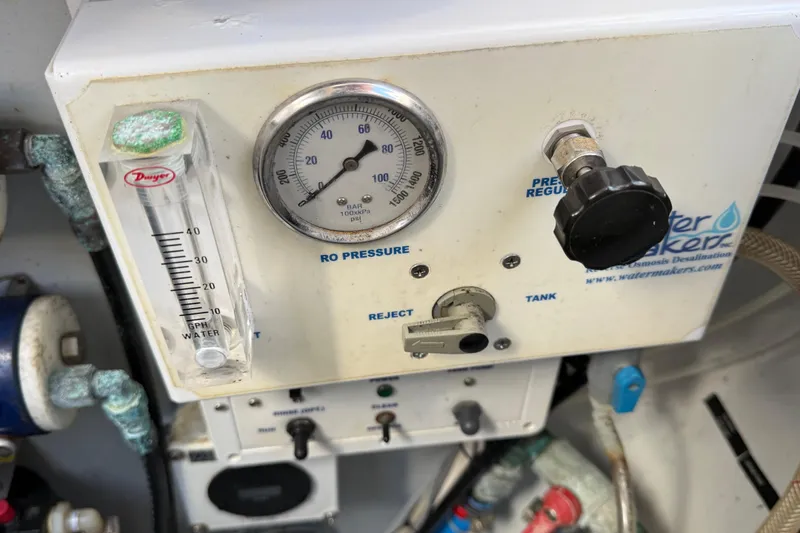  Yacht Photos Pics Control panel of a 2019 Lagoon 450 watermaker with pressure gauge and flow meter.