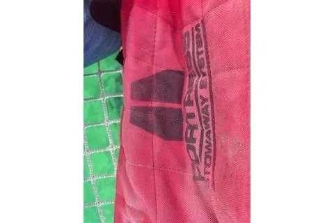  Yacht Photos Pics Red and green fabric with "Fortress Towaway Series" text, Lagoon 450, 2019 model.