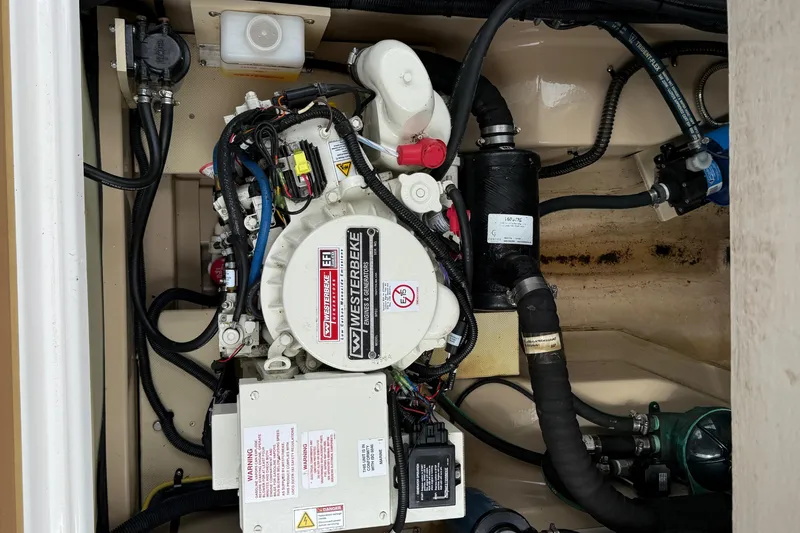 Seamore Yacht Photos Pics Engine compartment of 2020 Ranger Tugs R27LE with Westerbeke generator.