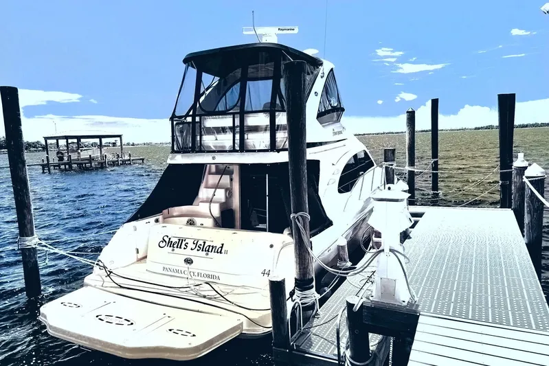 Shell’s Island II Yacht Photos Pics 2008 Sea Ray 44 Sedan Bridge yacht docked at marina, Panama City, Florida.