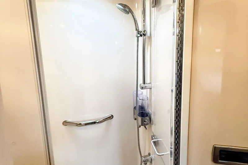 Shell’s Island II Yacht Photos Pics Shower area in 2008 Sea Ray 44 Sedan Bridge yacht, featuring modern fixtures.