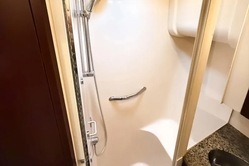 Shell’s Island II Yacht Photos Pics Shower area in 2008 Sea Ray 44 Sedan Bridge yacht, featuring sleek design and modern fixtures.