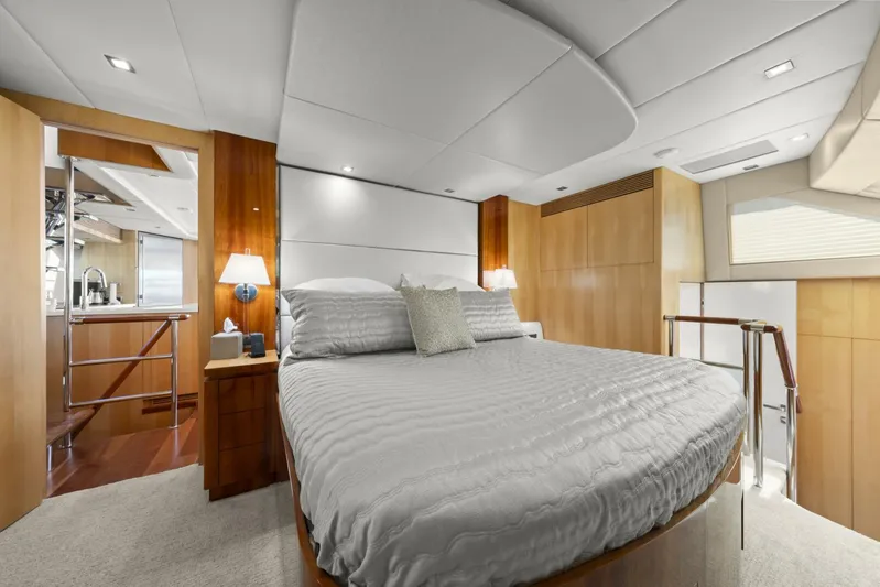 Tranquility Yacht Photos Pics Luxurious bedroom interior on 2013 Horizon PC60 yacht with modern design and cozy lighting.