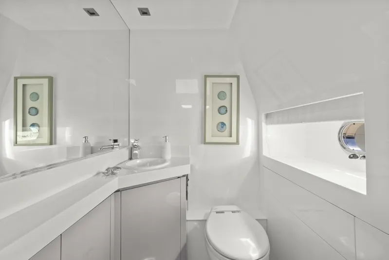 Tranquility Yacht Photos Pics Luxurious bathroom interior on 2013 Horizon PC60 yacht, featuring modern fixtures and elegant design.