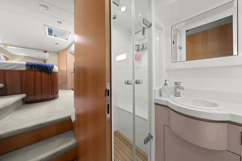 Tranquility Yacht Photos Pics Luxurious bathroom and bedroom interior of 2013 Horizon PC60 yacht.