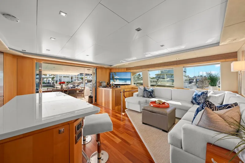 Tranquility Yacht Photos Pics Luxurious Horizon PC60 yacht interior with modern decor, spacious seating, and elegant wooden finishes.
