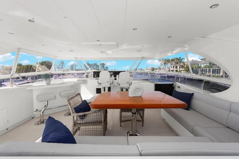 Tranquility Yacht Photos Pics Luxurious 2013 Horizon PC60 yacht interior with elegant seating and panoramic windows.