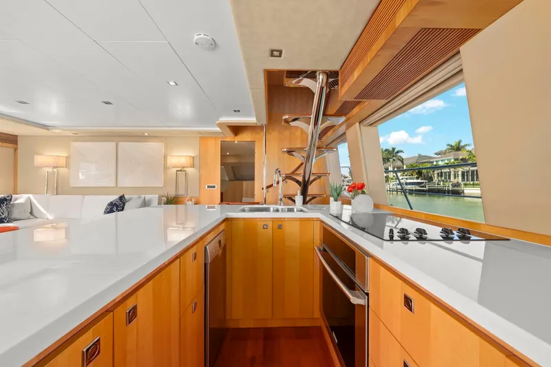 Tranquility Yacht Photos Pics Luxurious yacht kitchen interior with modern design, large windows, and sleek appliances on Horizon PC60, 2013.