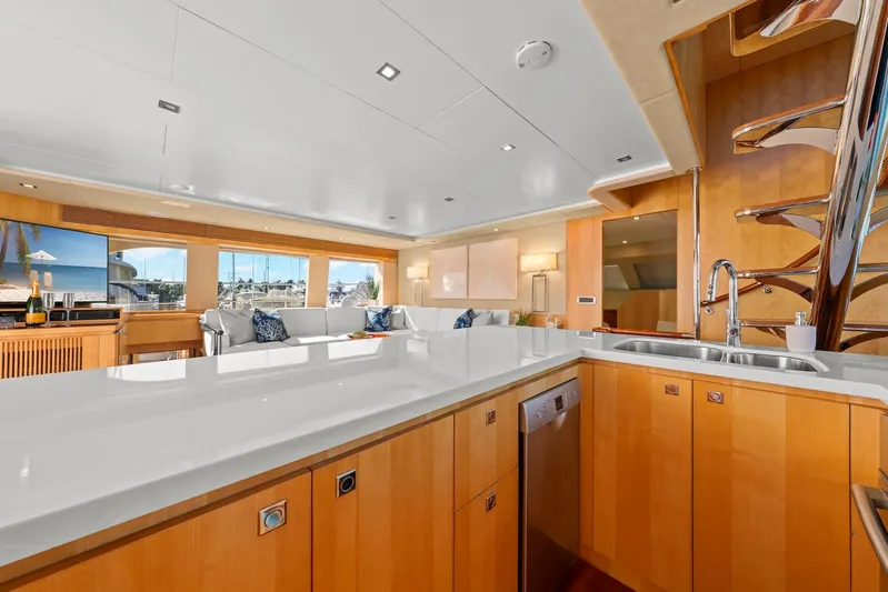 Tranquility Yacht Photos Pics Luxurious Horizon PC60 yacht interior with modern kitchen, spacious seating, and elegant design, 2013 model.