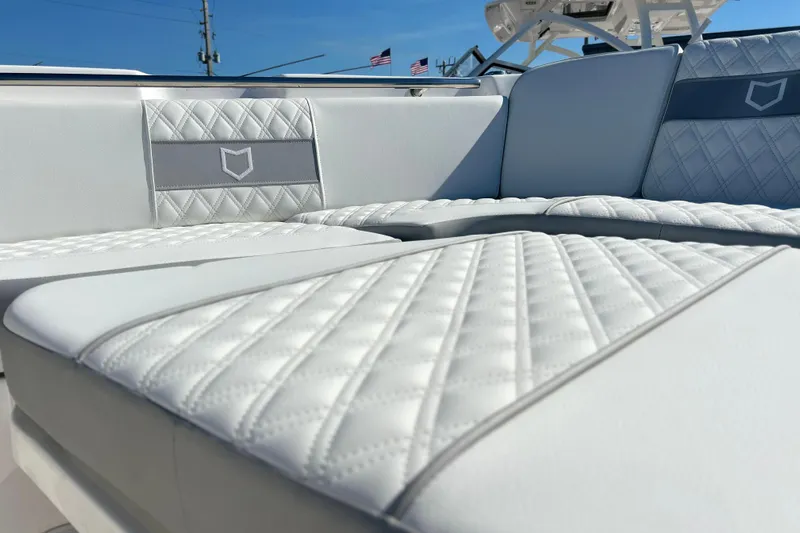  Yacht Photos Pics Luxurious seating on 2026 Sea Fox 288 Commander boat, featuring elegant diamond stitching.
