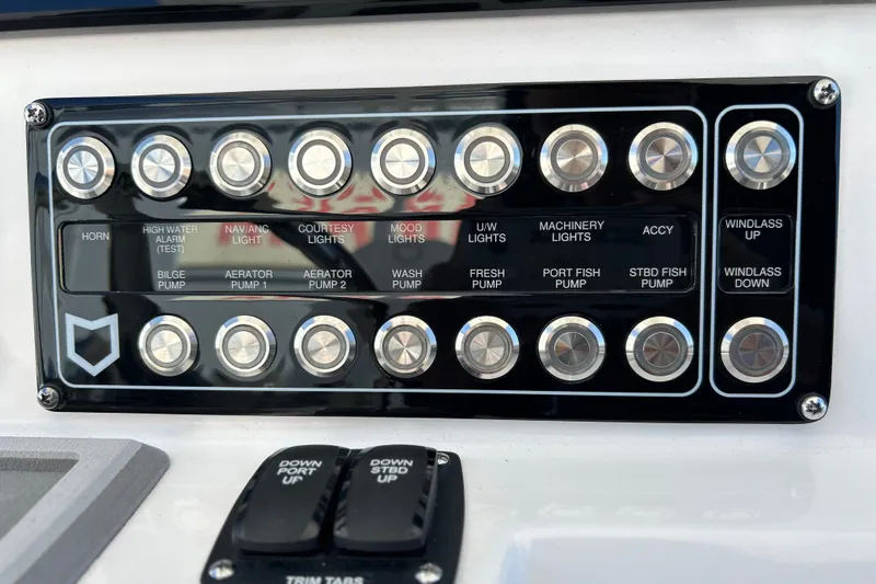  Yacht Photos Pics Control panel of 2026 Sea Fox 288 Commander boat with labeled buttons and switches.