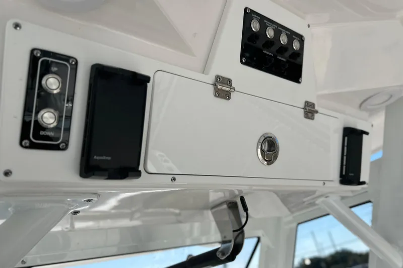  Yacht Photos Pics 2026 Sea Fox 288 Commander console with control panel and storage compartment.