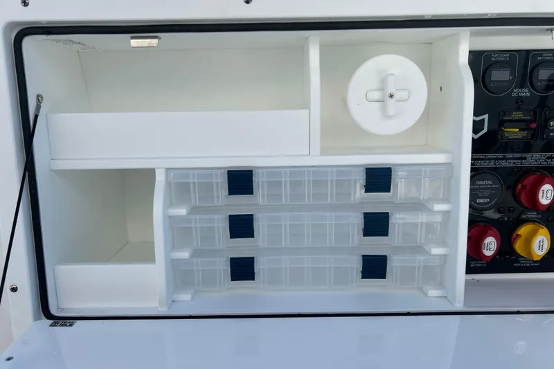  Yacht Photos Pics Storage compartment and control panel on 2026 Sea Fox 288 Commander boat.