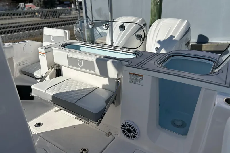  Yacht Photos Pics 2026 Sea Fox 288 Commander boat interior with seating and storage compartments.