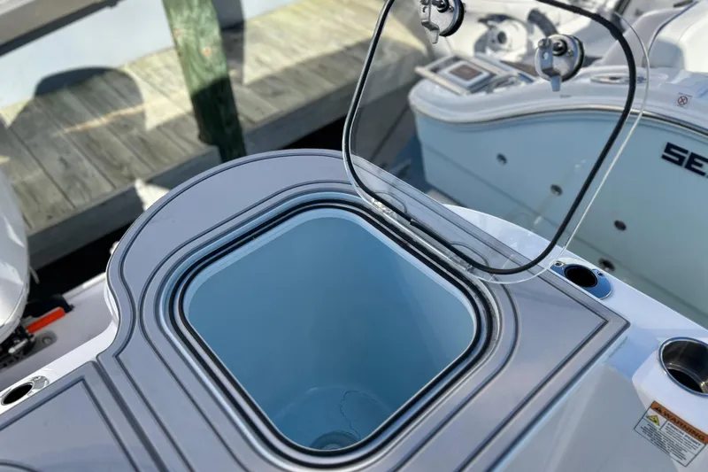  Yacht Photos Pics Open hatch on 2026 Sea Fox 288 Commander boat, showcasing storage compartment.