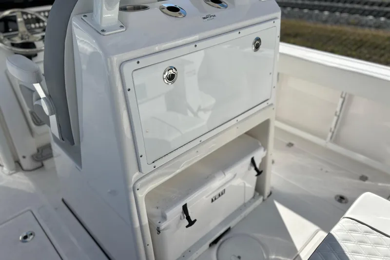  Yacht Photos Pics 2026 Sea Fox 288 Commander boat interior with storage compartment and cooler.