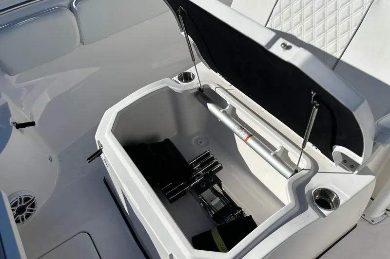  Yacht Photos Pics Open storage compartment on 2026 Sea Fox 288 Commander boat, featuring sleek white interior design.