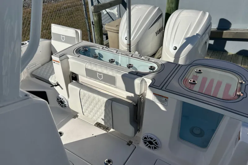  Yacht Photos Pics 2026 Sea Fox 288 Commander boat interior with Yamaha engines and seating area.