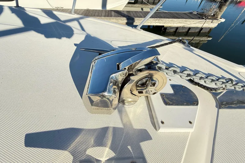 Sea Dated Yacht Photos Pics Anchor windlass on 1996 Cabo 35 boat deck, dockside view.