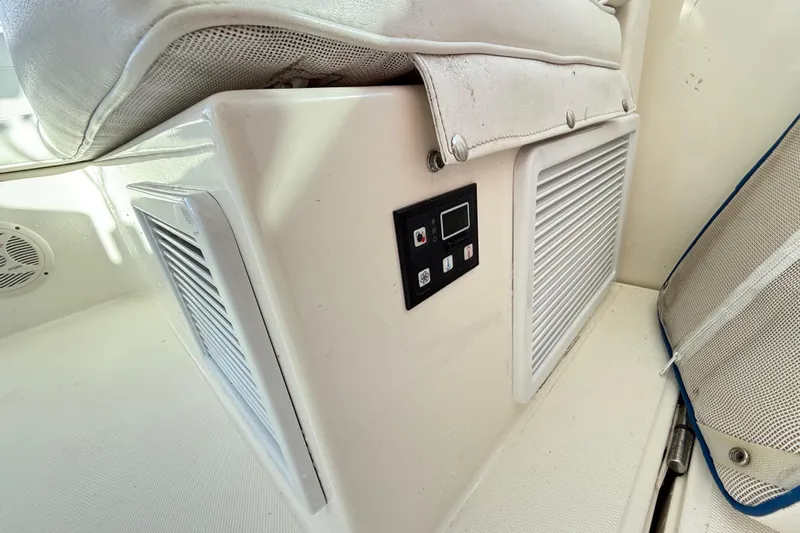 Sea Dated Yacht Photos Pics Interior of a 1996 Cabo 35 boat showing control panel and vent.