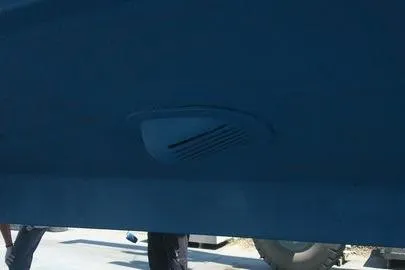 Sea Dated Yacht Photos Pics 1996 Cabo 35 boat hull with underwater vent detail.