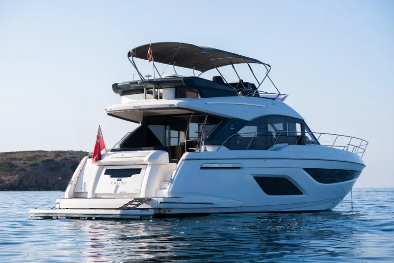 Valluga Yacht Photos Pics Luxury Bavaria R55 yacht from 2018 on calm sea waters.