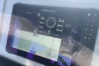 Lowrance navigation display on Saxdor 320 GTO, 2023 model, showing map and data.