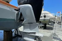 Outboard motor of 2023 Saxdor 320 GTO boat, displayed outdoors.