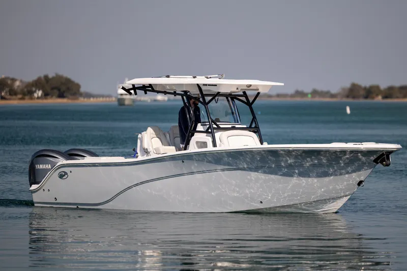  Yacht Photos Pics 2023 Sea Fox 288 Commander boat on calm water, featuring dual Yamaha engines.