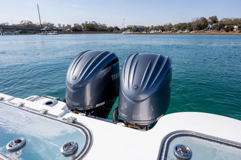  Yacht Photos Pics 2023 Sea Fox 288 Commander with dual Yamaha outboard engines on calm water.