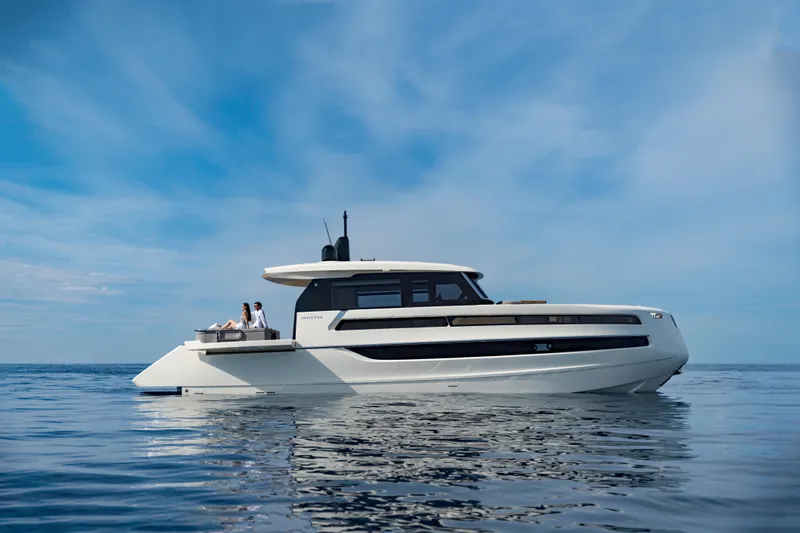  Yacht Photos Pics Luxury Invictus ST550 yacht cruising on calm ocean waters, 2025 model.