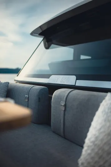  Yacht Photos Pics 2025 Invictus ST550 boat interior with modern seating and sleek design.