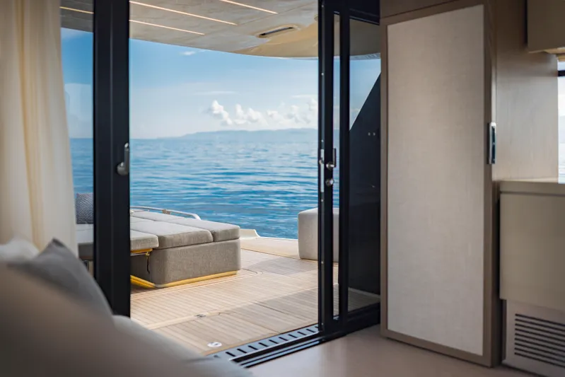  Yacht Photos Pics Luxurious Invictus ST550 yacht interior with ocean view, showcasing modern design and comfort, 2025 model.