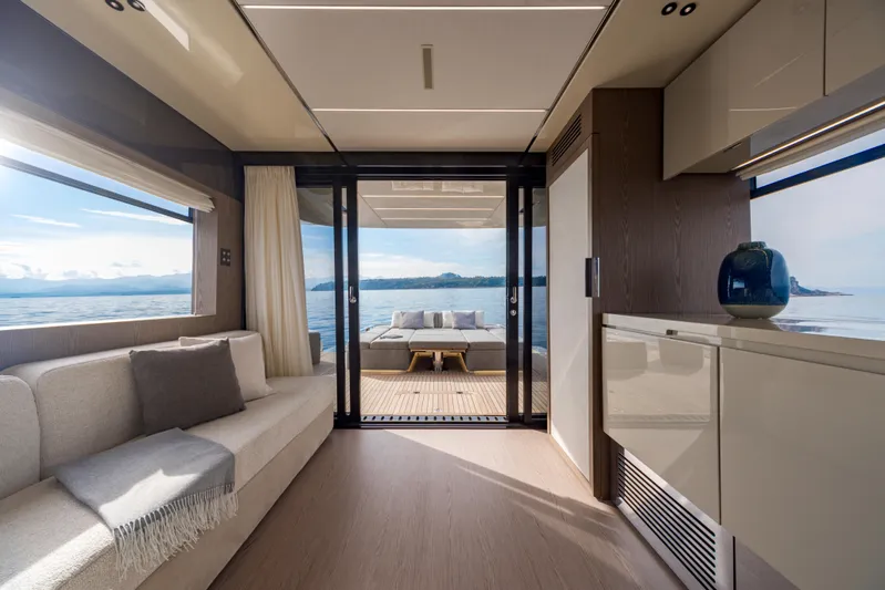  Yacht Photos Pics Luxurious interior of 2025 Invictus ST550 yacht with ocean view and modern furnishings.