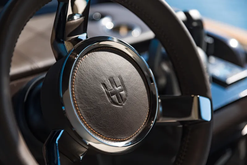  Yacht Photos Pics Steering wheel of 2025 Invictus ST550, featuring sleek design and luxurious leather finish.