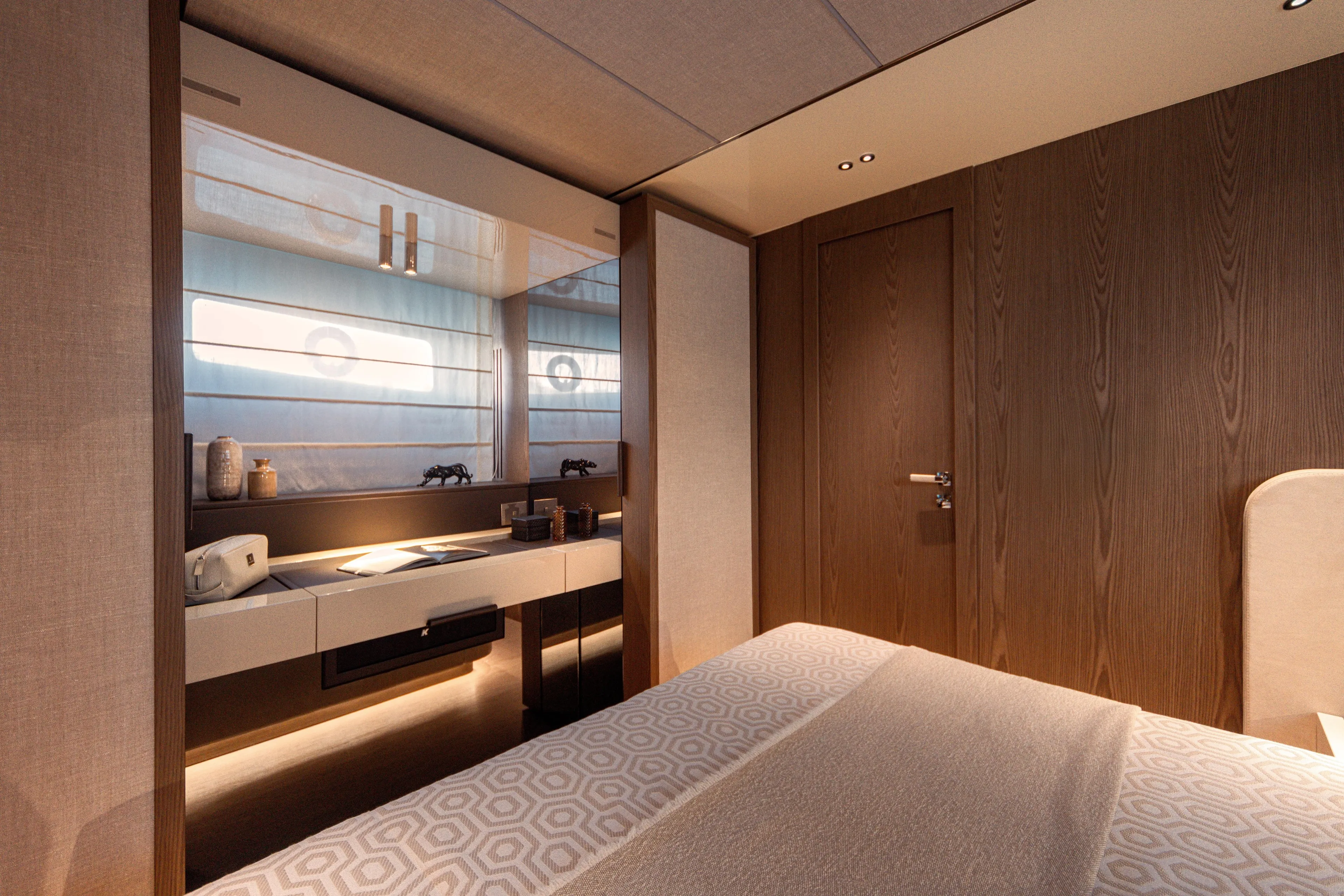  Yacht Photos Pics Luxurious cabin interior of 2025 Invictus ST550 yacht, featuring modern design and elegant furnishings.