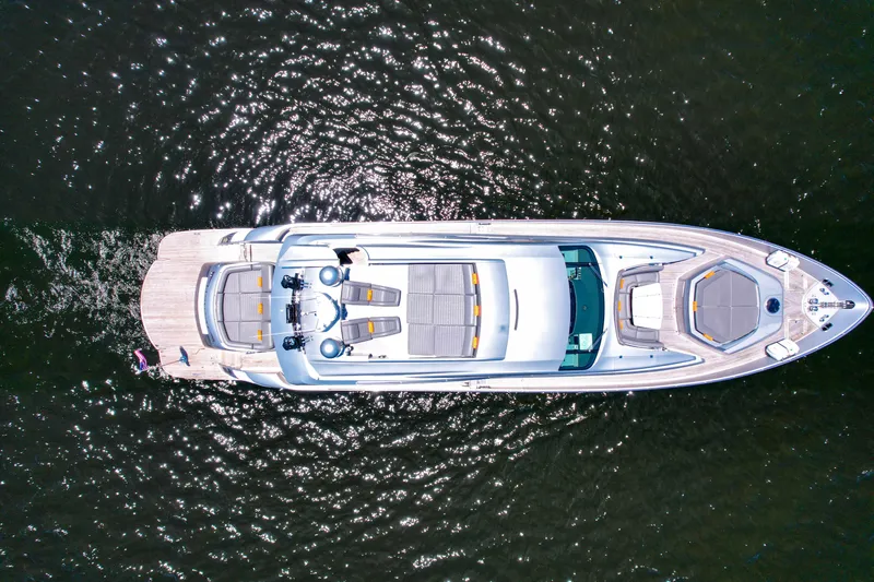 Shadow Yacht Photos Pics Aerial view of a 2007 Pershing 90 yacht cruising on water.