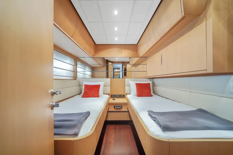 Shadow Yacht Photos Pics 2007 Pershing 90 yacht twin cabin with modern wood finish and cozy bedding.