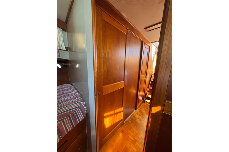 Good Enough Yacht Photos Pics Interior of 1990 Grand Banks 46 Classic yacht with wooden paneling and cozy cabin.