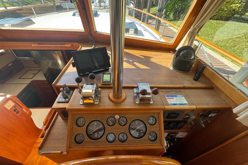 Good Enough Yacht Photos Pics Helm of 1990 Grand Banks 46 Classic yacht with navigation instruments and controls.