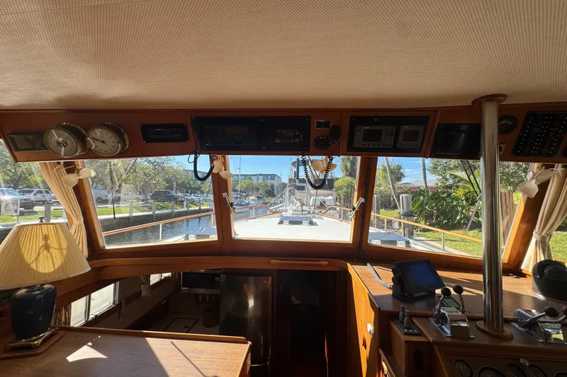 Good Enough Yacht Photos Pics Interior view of 1990 Grand Banks 46 Classic yacht, showcasing helm and navigation equipment.